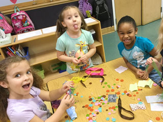 Children creating process art by using open-ended materials.